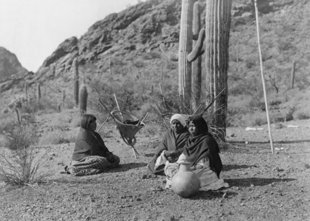Qahatika women resting in Harvest Field-Qahatika, c1907. Creator: Edward Sheriff Curtis.