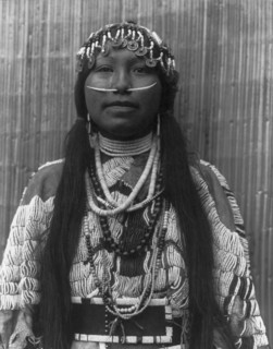 Wishham (i.e., Wishram) girl, c1910. Creator: Edward Sheriff Curtis.