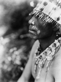 Coast Pomo with feather head-dress, c1924. Creator: Edward Sheriff Curtis.