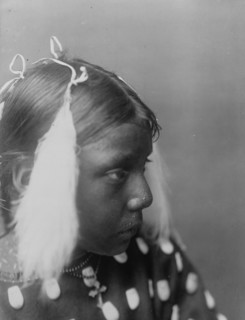 Red Cloud's granddaughter, c1907. Creator: Edward Sheriff Curtis.