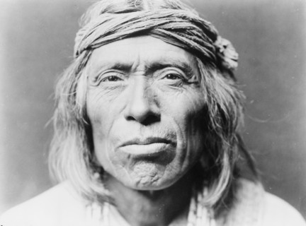 Head-and-shoulders portrait of Shiwawatiwa, a Zuni Indian, facing front, c1903. Creator: Edward Sheriff Curtis.