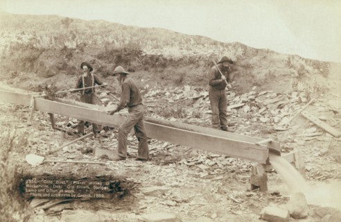 Gold Dust Placer mining at Rockerville, Dak Old timers, Spriggs, Lamb and Dillon at work, 1889. Creator: John C. H. Grabill.