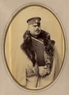 Firefighter A.F. Domishkevich in uniform, late 19th cent - early 20th cent. Creator: PA Milevskii.