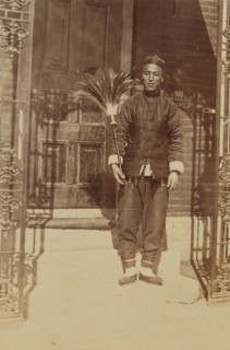 Thune Chin Sin, a Chinese house servant and errand boy, holding feather duster..., 1899. Creator: Eleanor Lord Pray.