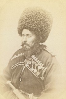 Half-length portrait of Daghestani man, facing left, between 1870 and 1886. Creator: Unknown.