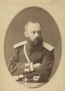 Makofski, half-length portrait, facing right, in police uniform, 1885. Creator: Unknown.