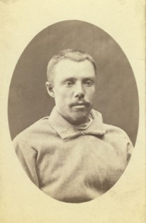 Head-and-shoulders portrait of a man, dressed in convict clothing, facing..., between 1880 and 1886. Creator: Unknown.