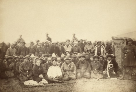 Kirghiz (ie Kazakh) tribesmen with a local Russian Governor and his wife, between 1885 and 1886. Creator: Unknown.