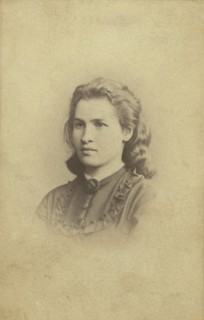 Alexandra Ivanova Uspenskaia, head-and-shoulders portrait, facing left, between 1870 and 1875. Creator: Unknown.