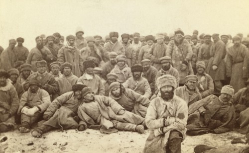 Group portrait of large group of convicts, between 1880 and 1886. Creator: Unknown.