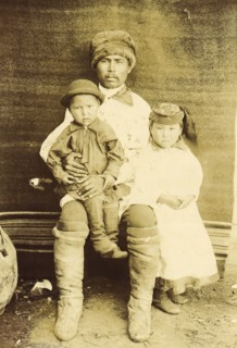 A Kachin Individual (over 30 Years Old). Tanzybaev with Children. Village of Ust'-Abakan, 1894. Creator: Unknown.