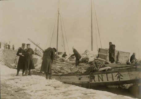 Japanese officers directing the unloading of supplies, Chemulpo, c1904. Creator: Robert Lee Dunn.