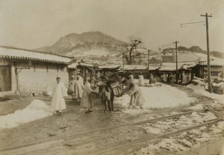 First arrival pack horses, Seoul, bound north, c1904. Creator: Robert Lee Dunn.