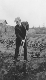 Frank G. Carpenter in a garden, between c1900 and 1916. Creator: Unknown.