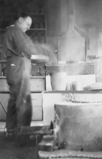 Mr. Kah smelting gold at the Assay Office, between c1900 and 1916. Creator: Unknown.