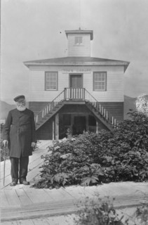 Father William Duncan, a missionary, in front of town library, between c1900 and 1923. Creator: Unknown.