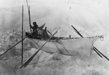 Eskimo in boat made with skins called an umiak, between c1900 and c1930. Creator: Unknown.