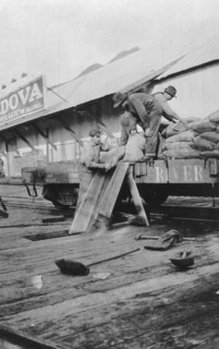 Loading copper, between c1900 and c1930. Creator: Unknown.
