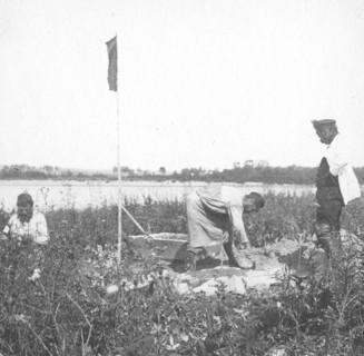 The moment of laying the benchmark on the river bank, 1909. Creator: Vladimir Ivanovich Fedorov.