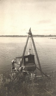 Repair of the boat "Mana" on the banks of the Zeya River, 1909. Creator: Vladimir Ivanovich Fedorov.