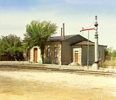 Railroad station with water crane and tracks, between 1905 and 1915. Creator: Sergey Mikhaylovich Prokudin-Gorsky.