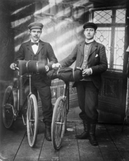 Cyclists in the studio; two men with bicycles, 1890-1910. Creator: Lars Olsson Akerman.