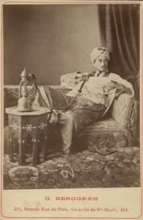 Marquis Claes Lagergren (1853-1930) in eastern costume smoking a hookah. Creator: Guillaume Berggren.