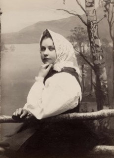 Photograph of a young girl in a white blouse and white headscarf, 1880-1890. Creator: Helene Edlund.