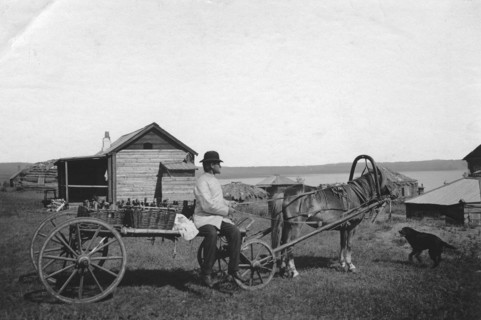 A kumys delivery man at the resort of Lake Shira, 1900-1909. Creator: LI Vonago.
