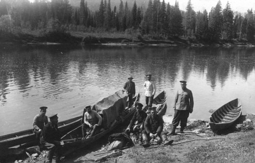 Topographers by the Boats on the Mrassu River Shore, Near the Ust'-Kabyrza Ulus, 1913. Creator: GI Ivanov.
