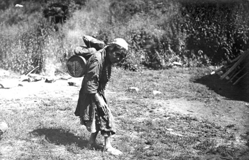Shoria Woman Carrying a Load, 1913. Creator: GI Ivanov.