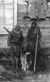 Two Chukchi in national clothes, with guns and a spear, 1910-1929. Creator: Ivan Emelianovich Larin.