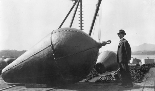 Frank G. Carpenter on lighthouse wharf, Ketchikan, 1915. Creator: Unknown.