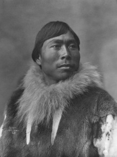 Eskimo posing , c1903, printed (1927?). Creator: Lomen Brothers.