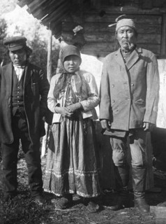 Two Tungus men and a woman with a cross on her chest, 1920-1939. Creator: Unknown.