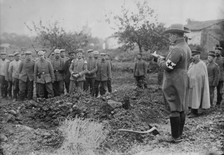 German Field chaplain burying French Officer who died in hospital, 1914. Creator: Bain News Service.