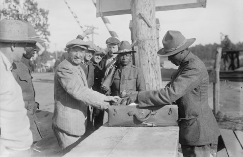 Examining pkges, Camp Upton, Sept 1917. Creator: Bain News Service.