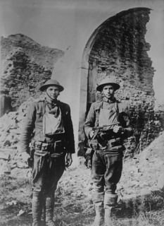 U.S. soldiers & German pistol, 11 Mar 1918. Creator: Bain News Service.