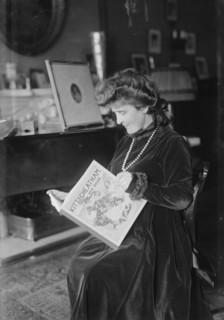 Kitty Cheatham [with her book], 1916. Creator: Bain News Service.