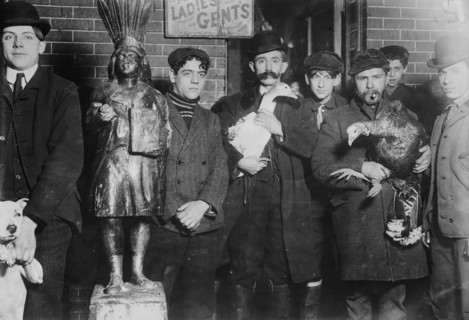 Taking home geese won at raffle, Xmas, 1910. Creator: Bain News Service.