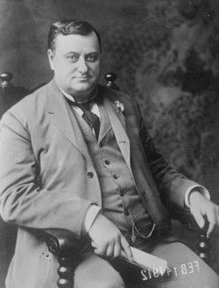 Chas. E. Piper, seated, 1912. Creator: Bain News Service.