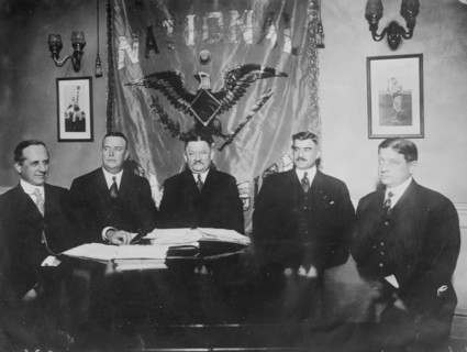 J.E. Bruce, Ban Johnson, A. Herrmann, T.J. Lynch, J.A. Heydler at table together, 1910. Creator: Bain News Service.