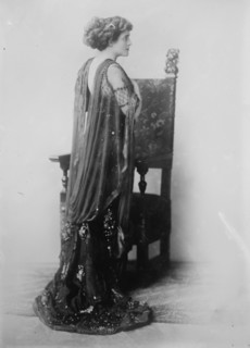 Katherine Kaelred standing before chair, Moffett Studio in Chicago, 1910. Creator: Bain News Service.