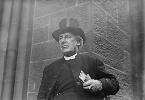 Bishop of Salisbury holding glasses and train schedule, 1910. Creator: Bain News Service.