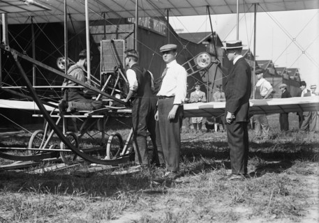 W.R. Kimball & aeroplane, between c1910 and c1915. Creator: Bain News Service.