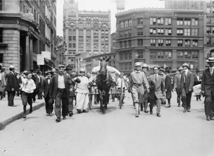 D.H. Woolf and wife arriving in N.Y.C., 1910. Creator: Bain News Service.