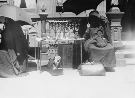 Outside church of St. Jean Baptiste, selling beads, etc., between c1910 and c1915. Creator: Bain News Service.