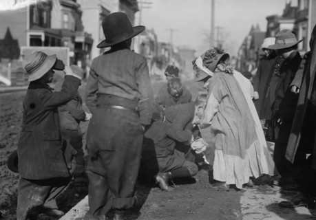 Scramble for pennies, Thanksgiving, between c1910 and c1915. Creator: Bain News Service.