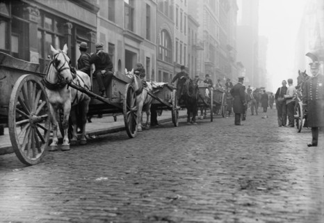 Garbage carts protected by police, 1911. Creator: Bain News Service.
