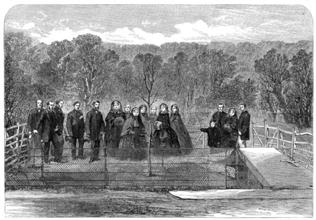 Her Majesty the Queen planting the "Prince Consort's Oak" in Windsor Great Park, 1862. Creator: Unknown.